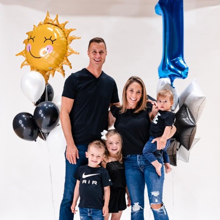 Marcelle Provencial and her husband Jon Scheyer celebrating the first birthday of James Russell Scheyer. 